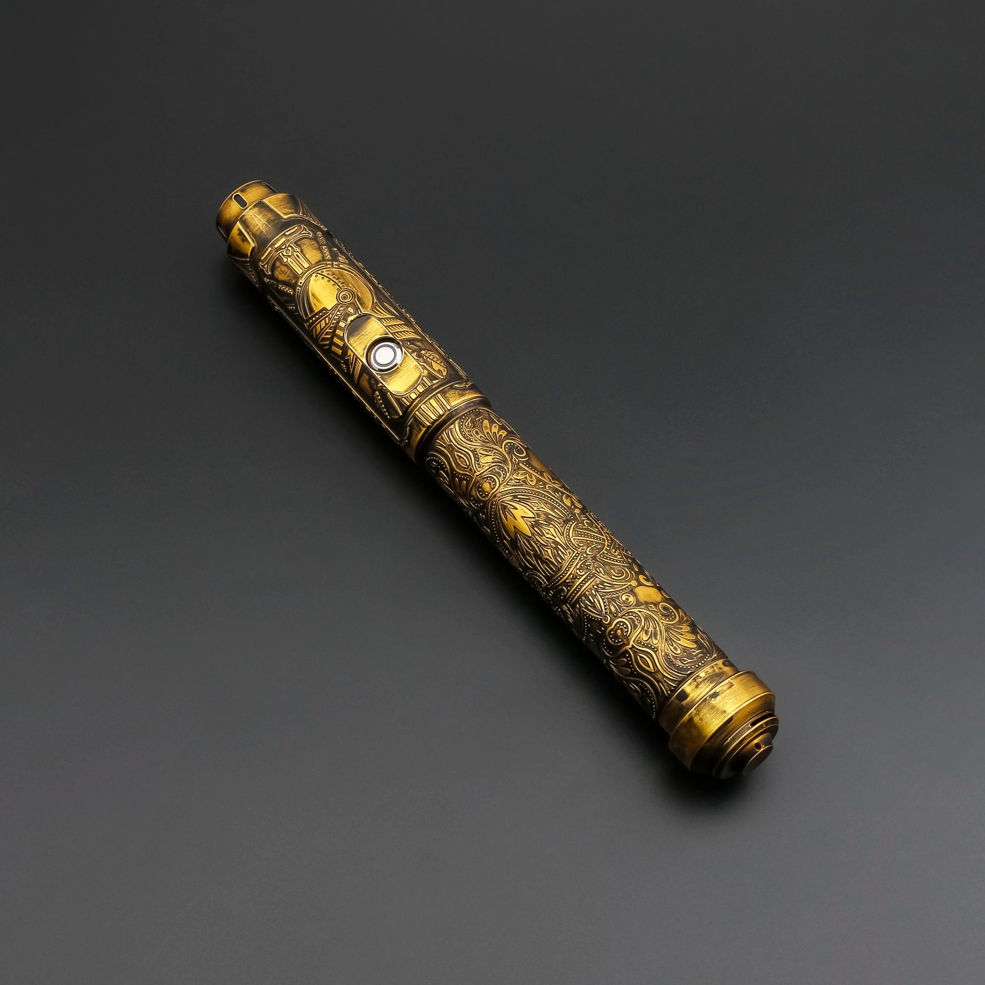 Decorative gold cylindrical object on a dark gray background