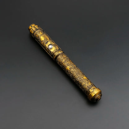 Decorative gold cylindrical object on a dark gray background