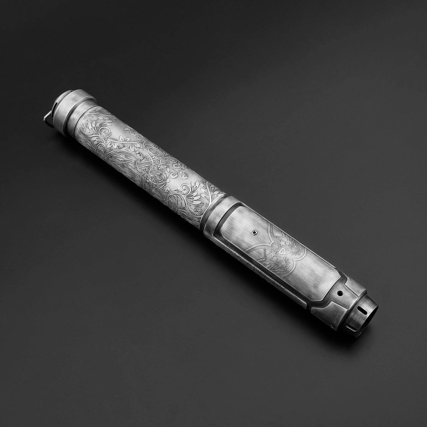 Decorative metal pen on a dark background